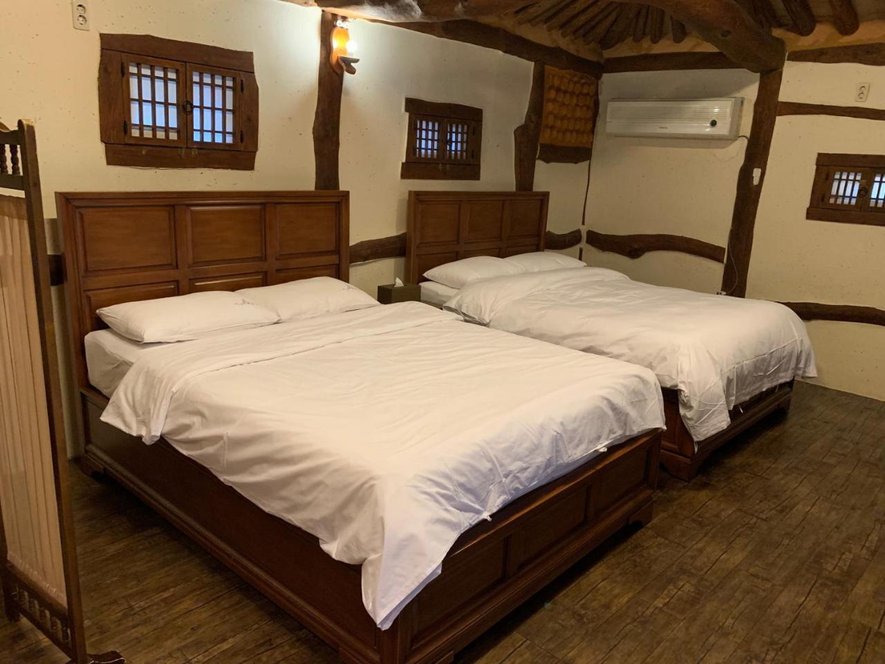 Kasan Tobang Hostel Seogwipo Bagian luar foto